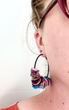 glitter fluff hoop earrings. blue rainbow . large black