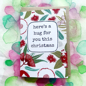 christmas greeting card . here’s a hug