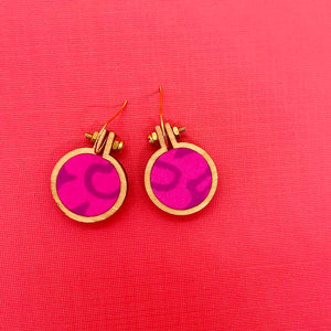 mini hoop earrings . electric pink .